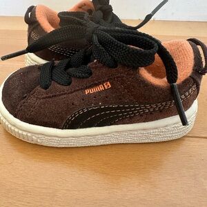 Brown and orange Puma kinder fit baby shoes